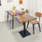 wood grain dining chair with black metal frame