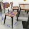 wood grain dining chair with black metal frame